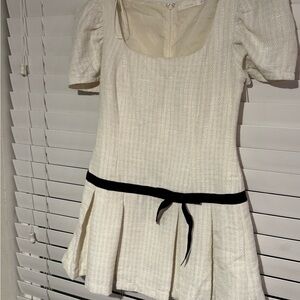 Elegant Cream Dress with Black Ribbon